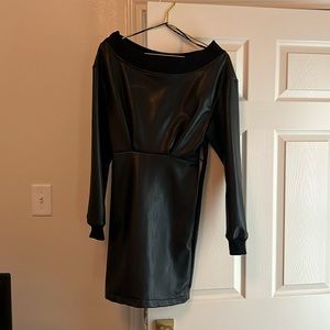 R + A mini dress.  Leather long sleeved with side zipper.  Worn once size 4